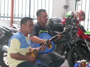 musicians now sit amongst the motorbikes